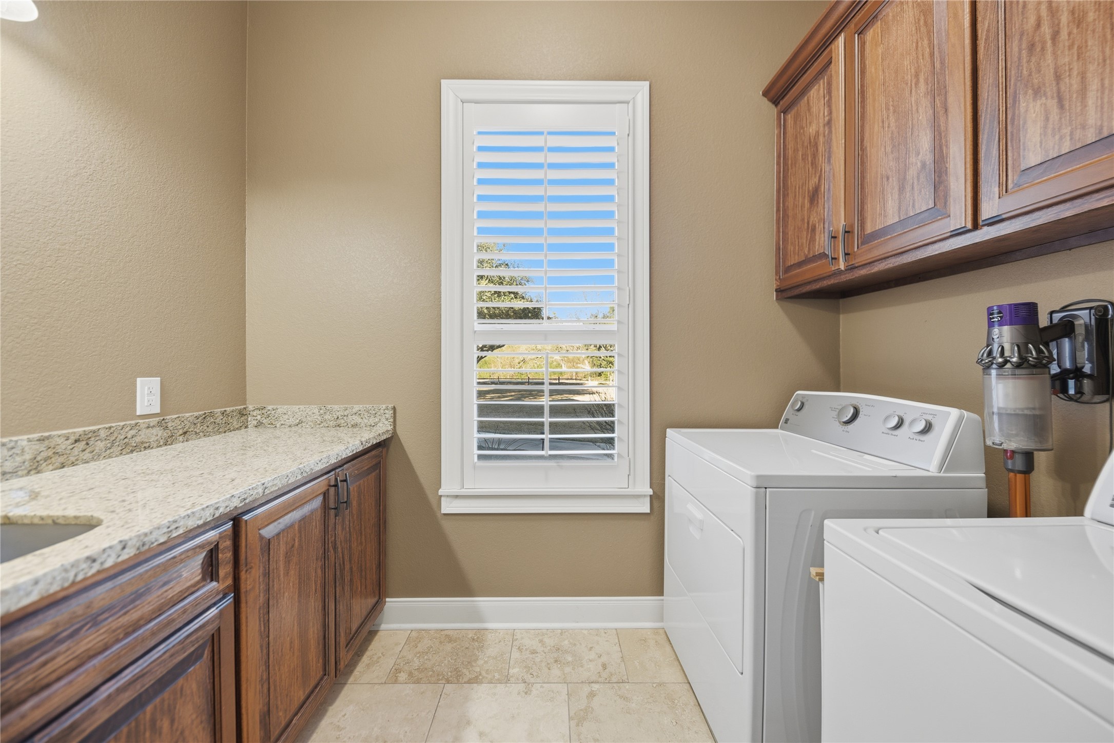 110 Windy Acres Road Brenham, TX 77833 - Photo 27 of 38 a utility room with dryer and washer