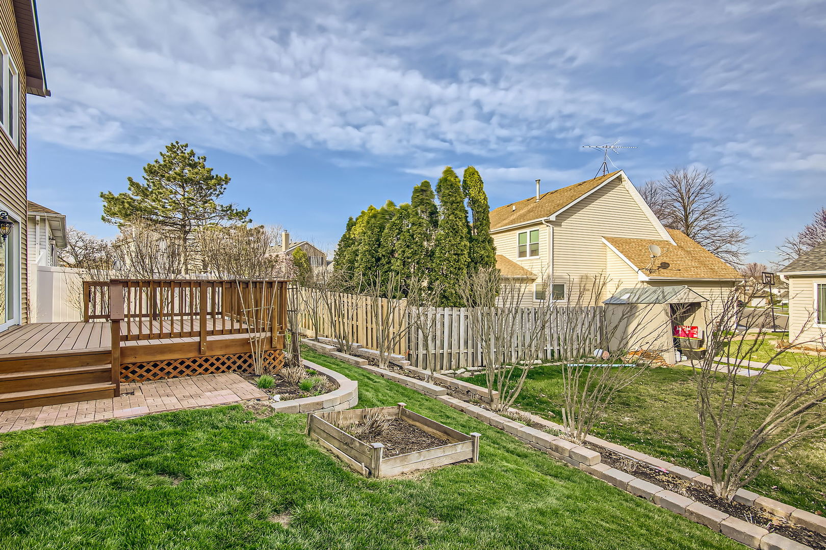 4665 Olmstead Drive Hoffman Estates, IL 60192 - Photo 17 of 42 a view of a garden with a small yard