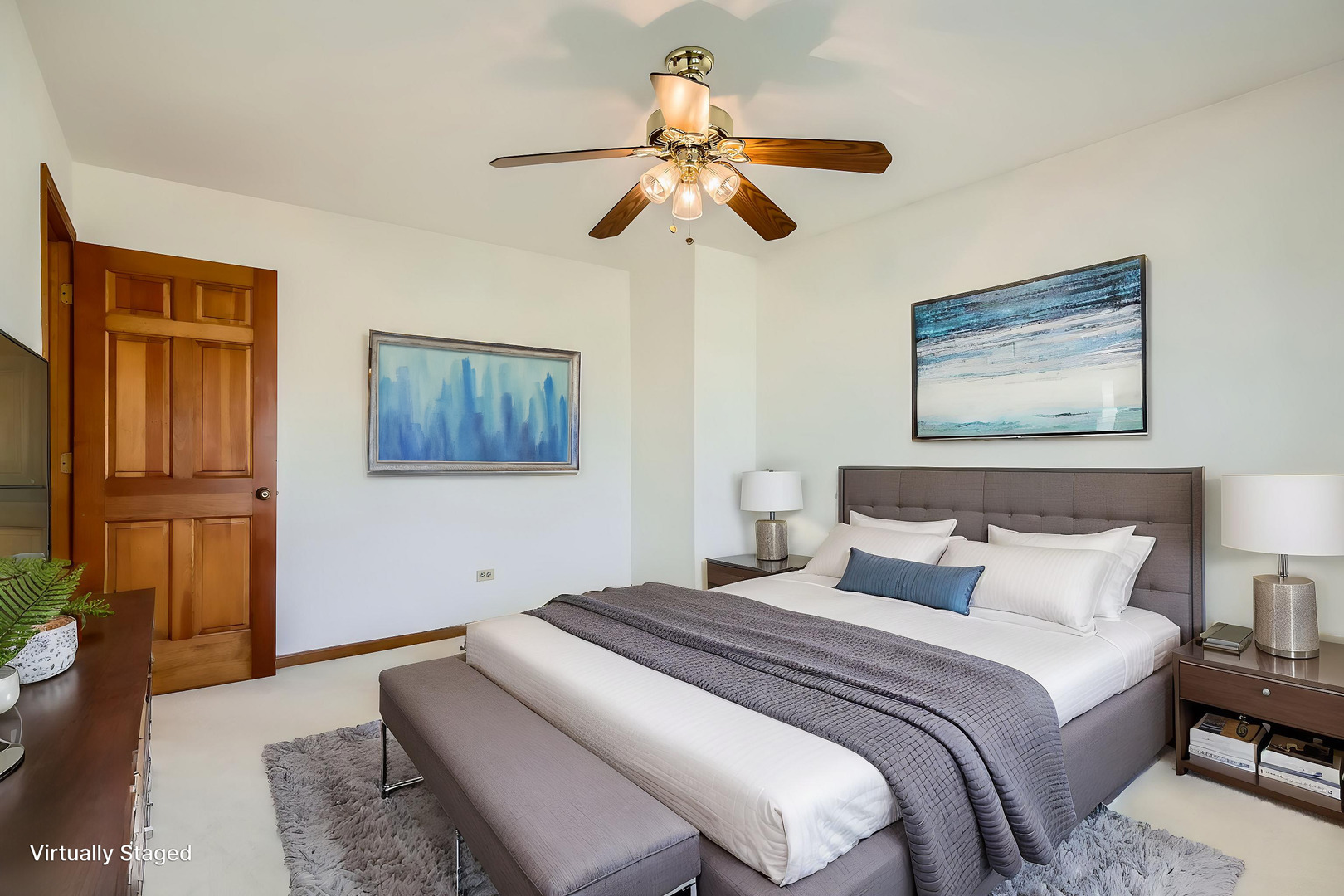 4665 Olmstead Drive Hoffman Estates, IL 60192 - Photo 7 of 42 a bedroom with a bed and a chandelier