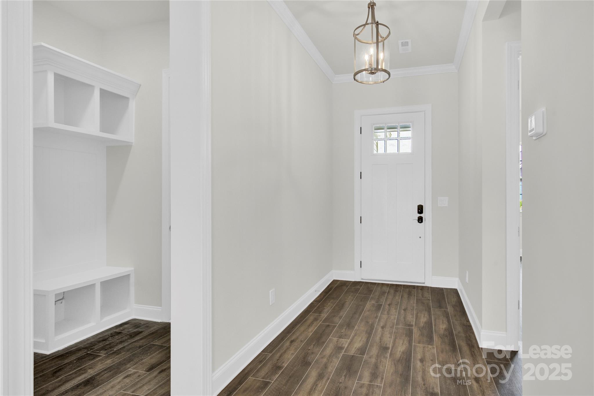 4715 Anise Circle, Unit 40 Sherrills Ford, NC 28673 - Photo 13 of 20 a view of a hallway with wooden floor and staircase