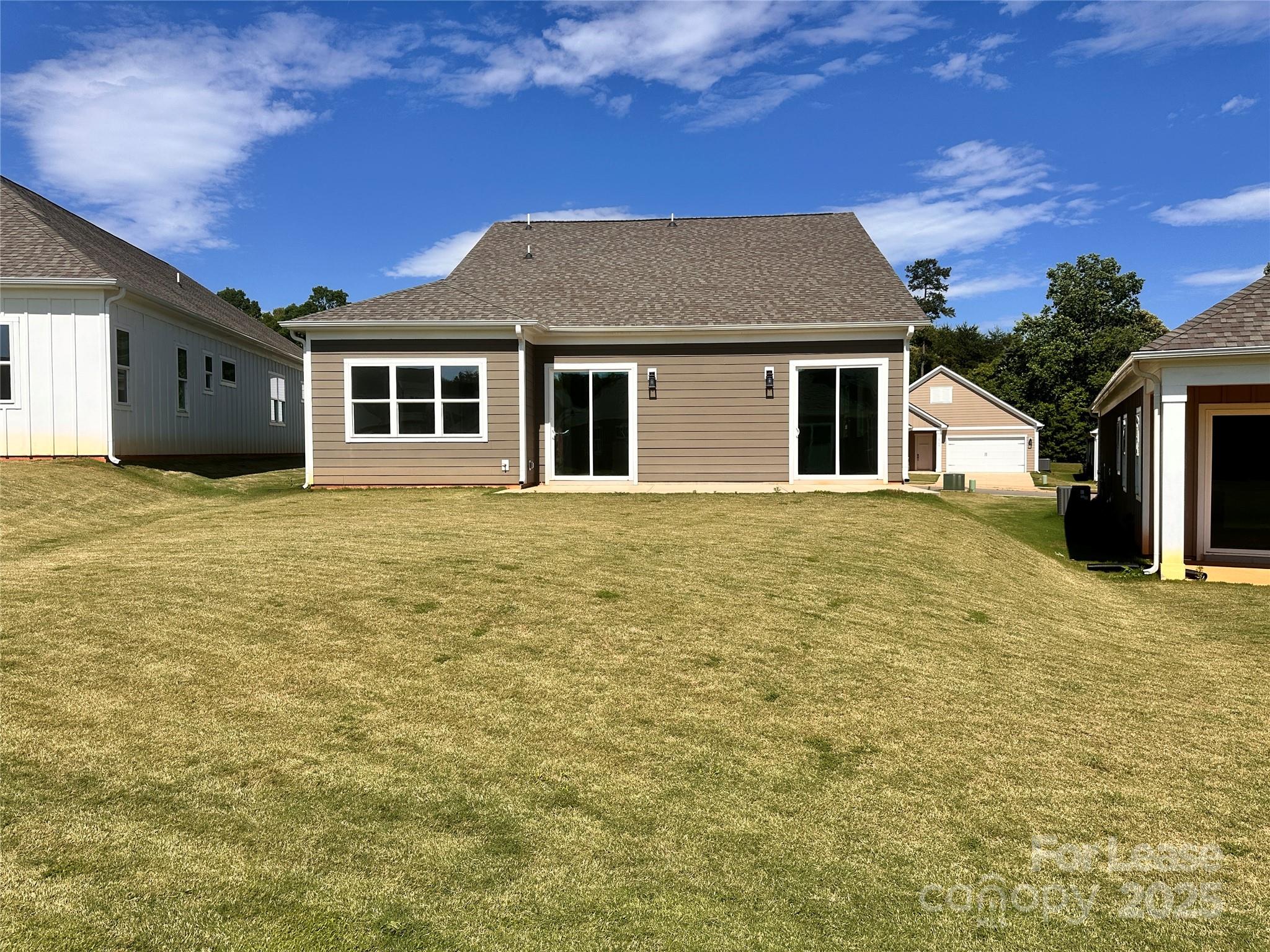 4715 Anise Circle, Unit 40 Sherrills Ford, NC 28673 - Photo 2 of 20 a front view of a house with a yard