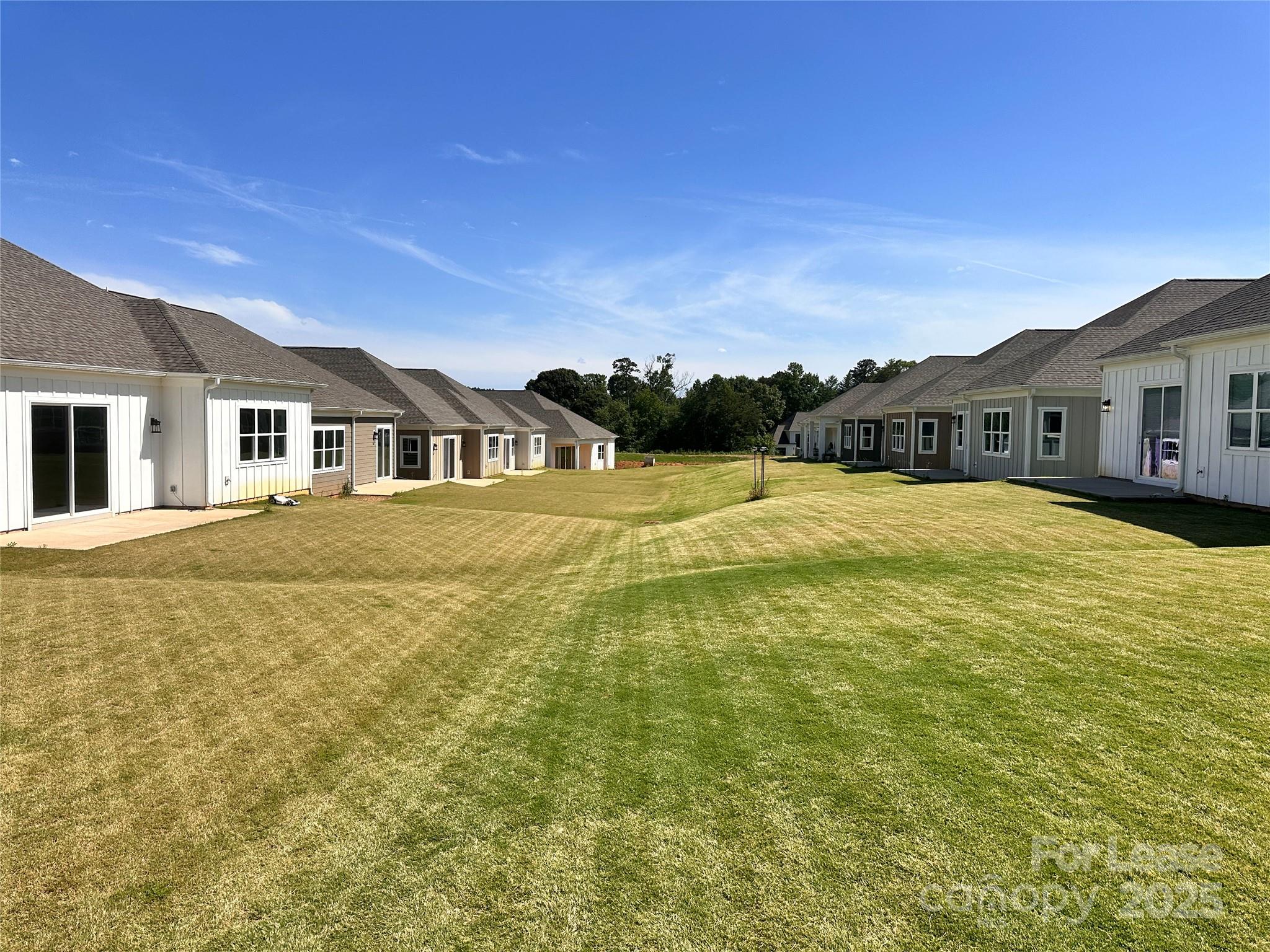 4715 Anise Circle, Unit 40 Sherrills Ford, NC 28673 - Photo 3 of 20 a view of an white house with a swimming pool