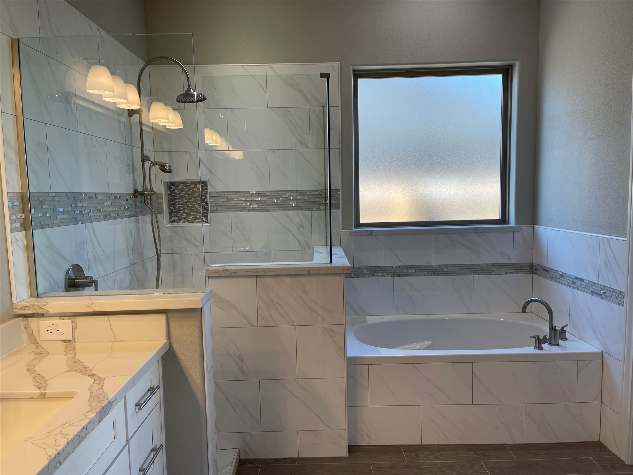 10440 Dominion Ranch Drive Port Arthur, TX 77640 - Photo 13 of 22 a bathroom with a bathtub and shower