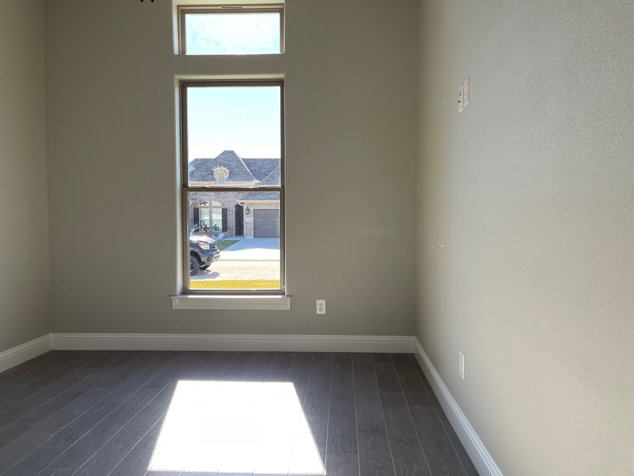 10440 Dominion Ranch Drive Port Arthur, TX 77640 - Photo 17 of 22 an empty room with a window