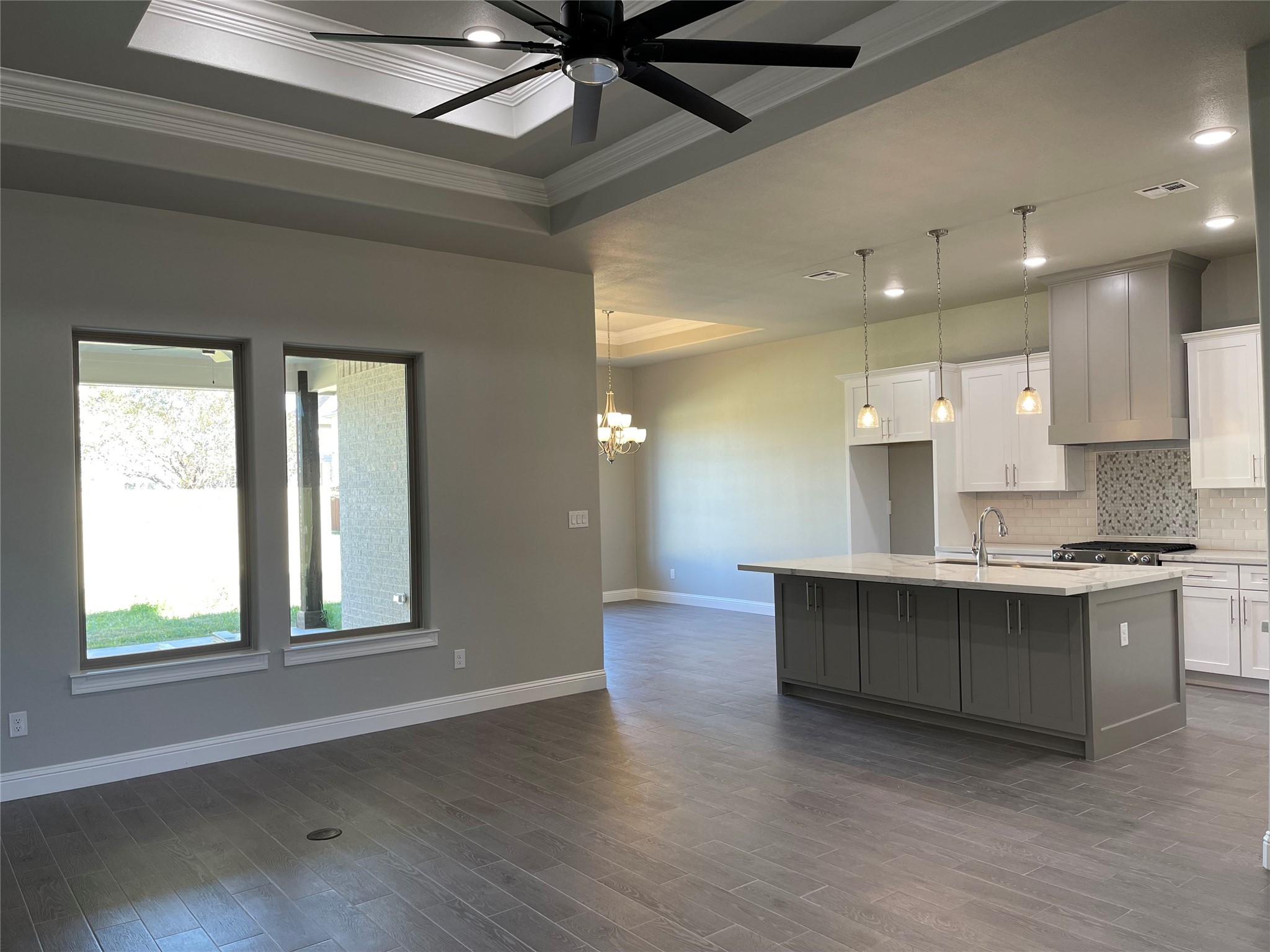 10440 Dominion Ranch Drive Port Arthur, TX 77640 - Photo 3 of 22 a large kitchen with stainless steel appliances granite countertop a stove and a window