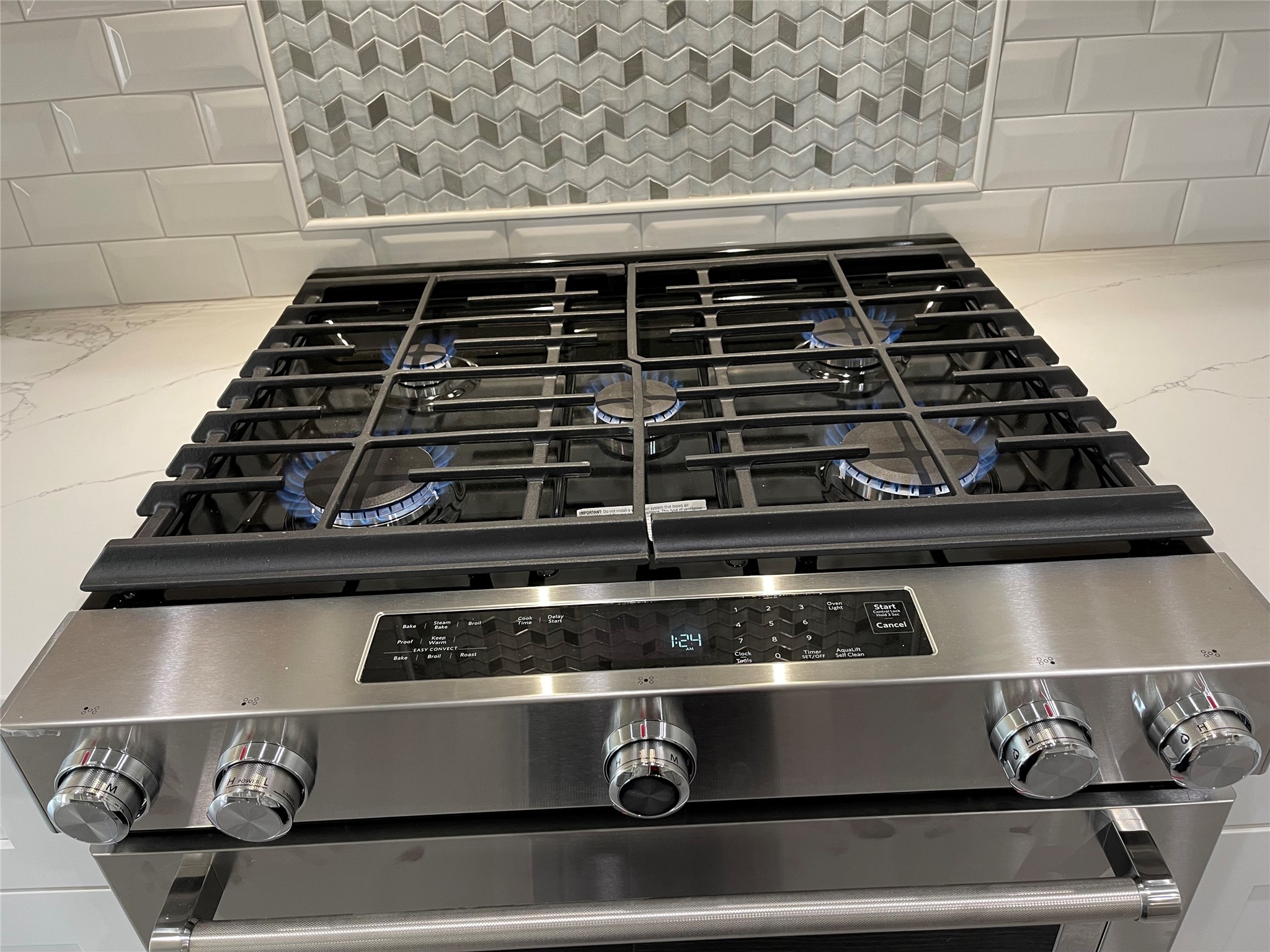 10440 Dominion Ranch Drive Port Arthur, TX 77640 - Photo 7 of 22 a close up of a stove