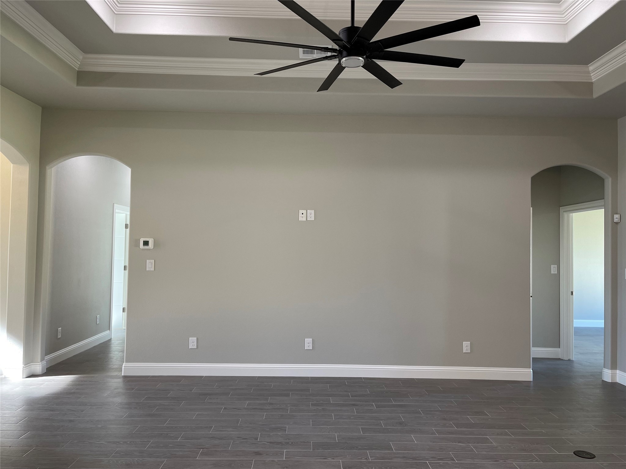 10440 Dominion Ranch Drive Port Arthur, TX 77640 - Photo 9 of 22 a view of a room with wooden floor and white walls
