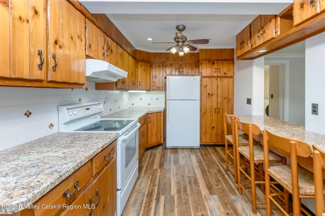 a view of a living room and dining room