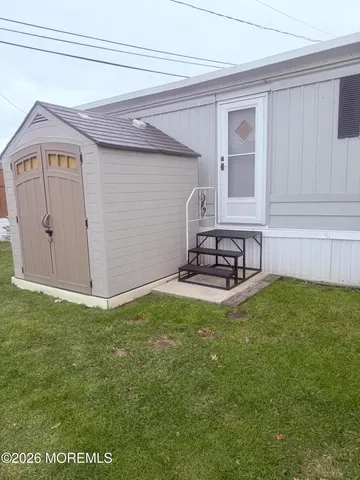 a view of a back yard of the house