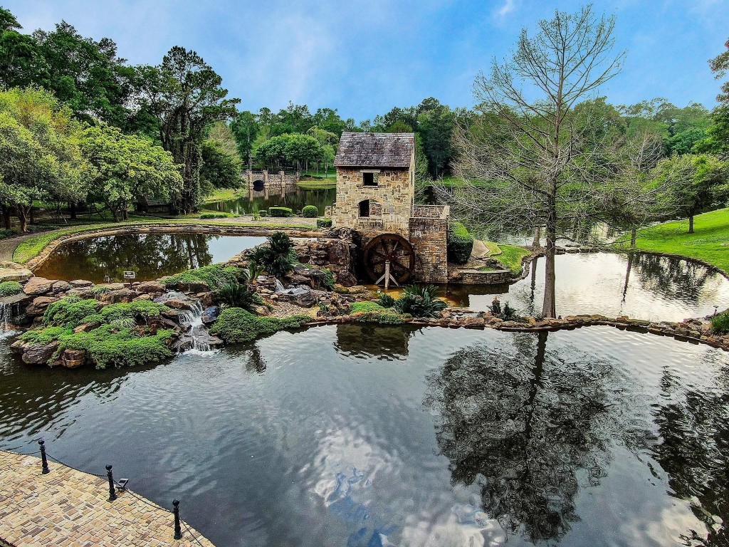 14530 Millhouse Road Pinehurst, TX 77362 - Photo 43 of 46 Welcome to Old Mill Lake, where natural beauty and peaceful living come together in a truly exceptional setting. Enjoy picturesque park and lake views throughout this stunning gated community. Tucked away from the everyday hustle, crossing through the gates feels like entering your own private retreat