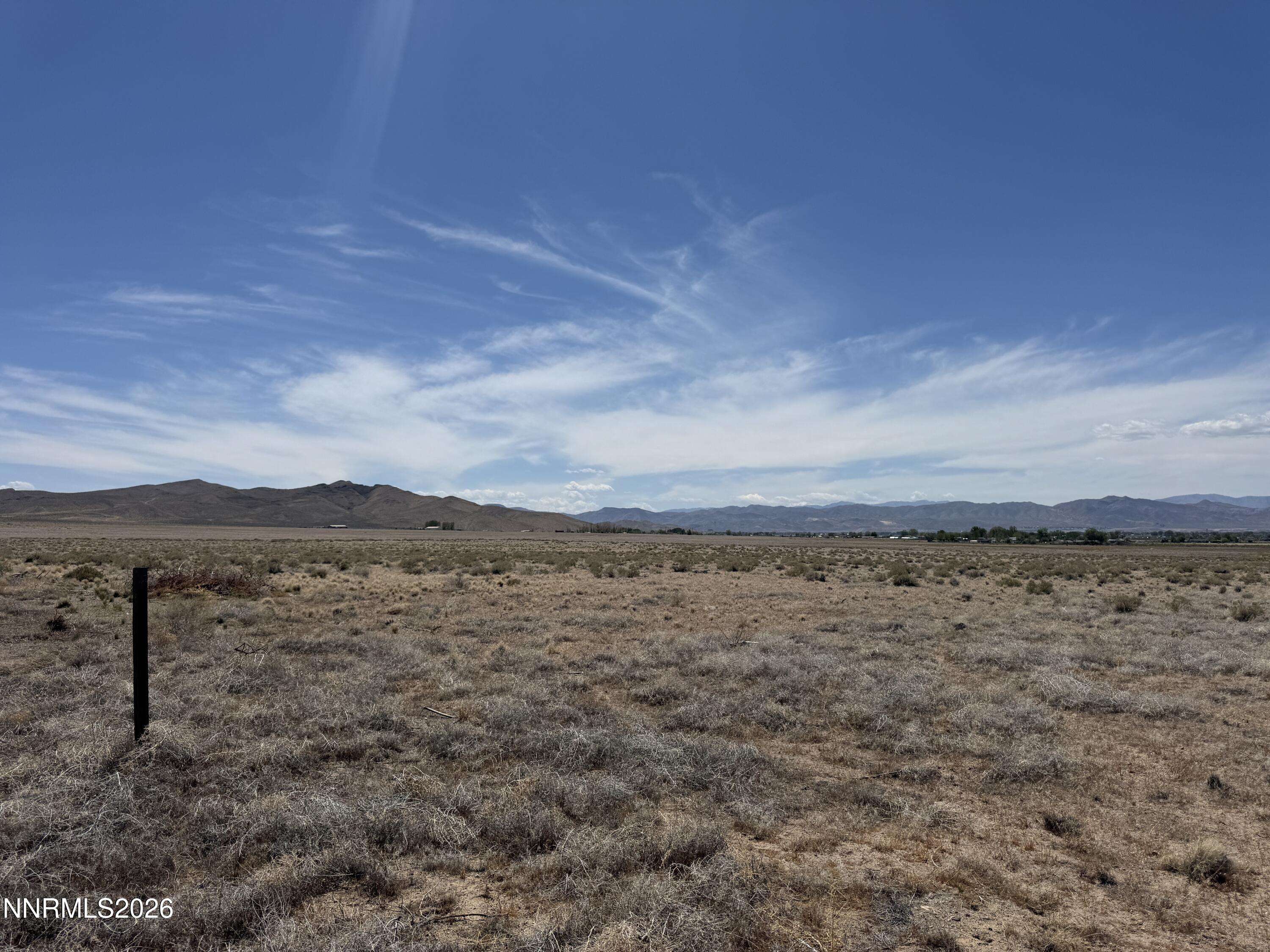 0 Rock Road Yerington, NV 89447 - Photo 4 of 12 a view of lake with mountain