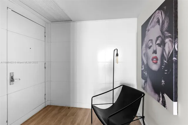 a bathroom with a shower and a sink