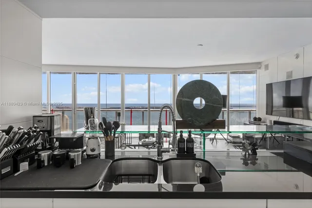 a view of a living room and dining room