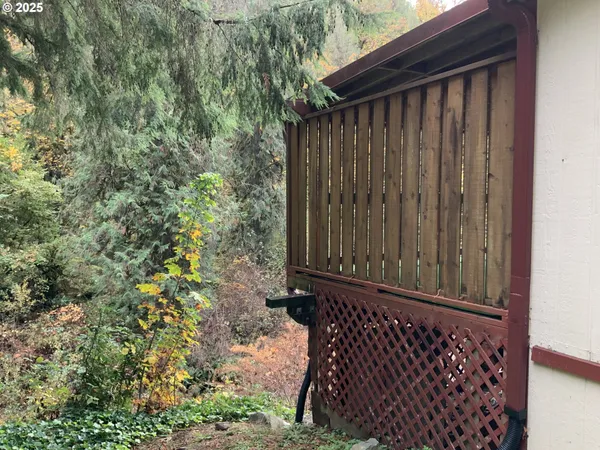 a view of a wooden fence
