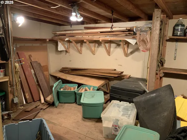 a bathroom with a washing machine and air hockey table