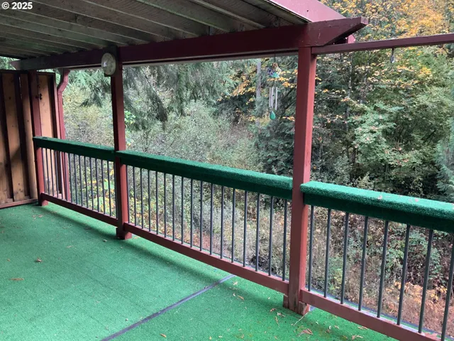 a view of a porch with a big yard