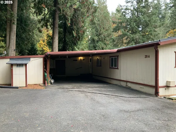 a view of a balcony with tree