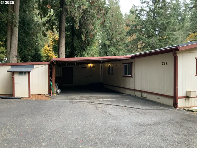 a view of a balcony with tree
