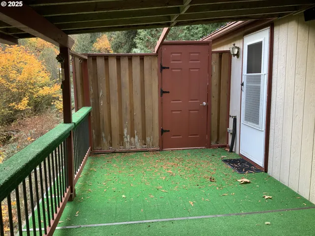 a view of backyard with green space