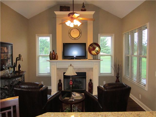 4799 Sango Road Clarksville, TN 37043 - Photo 12 of 20 a living room with furniture and a fireplace