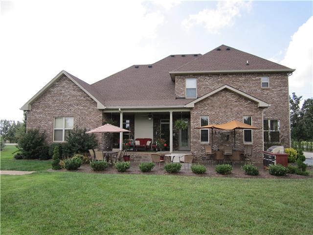 4799 Sango Road Clarksville, TN 37043 - Photo 4 of 20 a front view of a house with garden