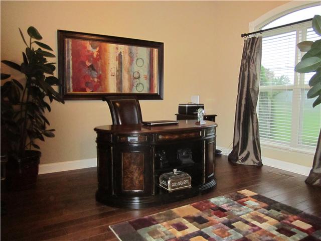 4799 Sango Road Clarksville, TN 37043 - Photo 7 of 20 a living room with furniture and a fireplace