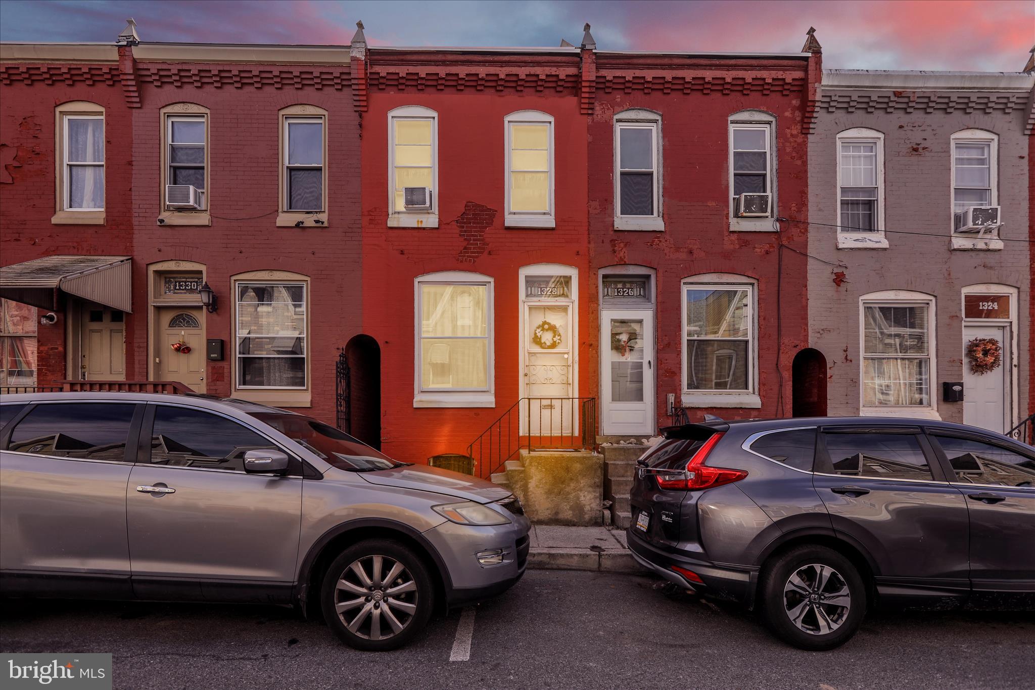 a car parked in front of a building