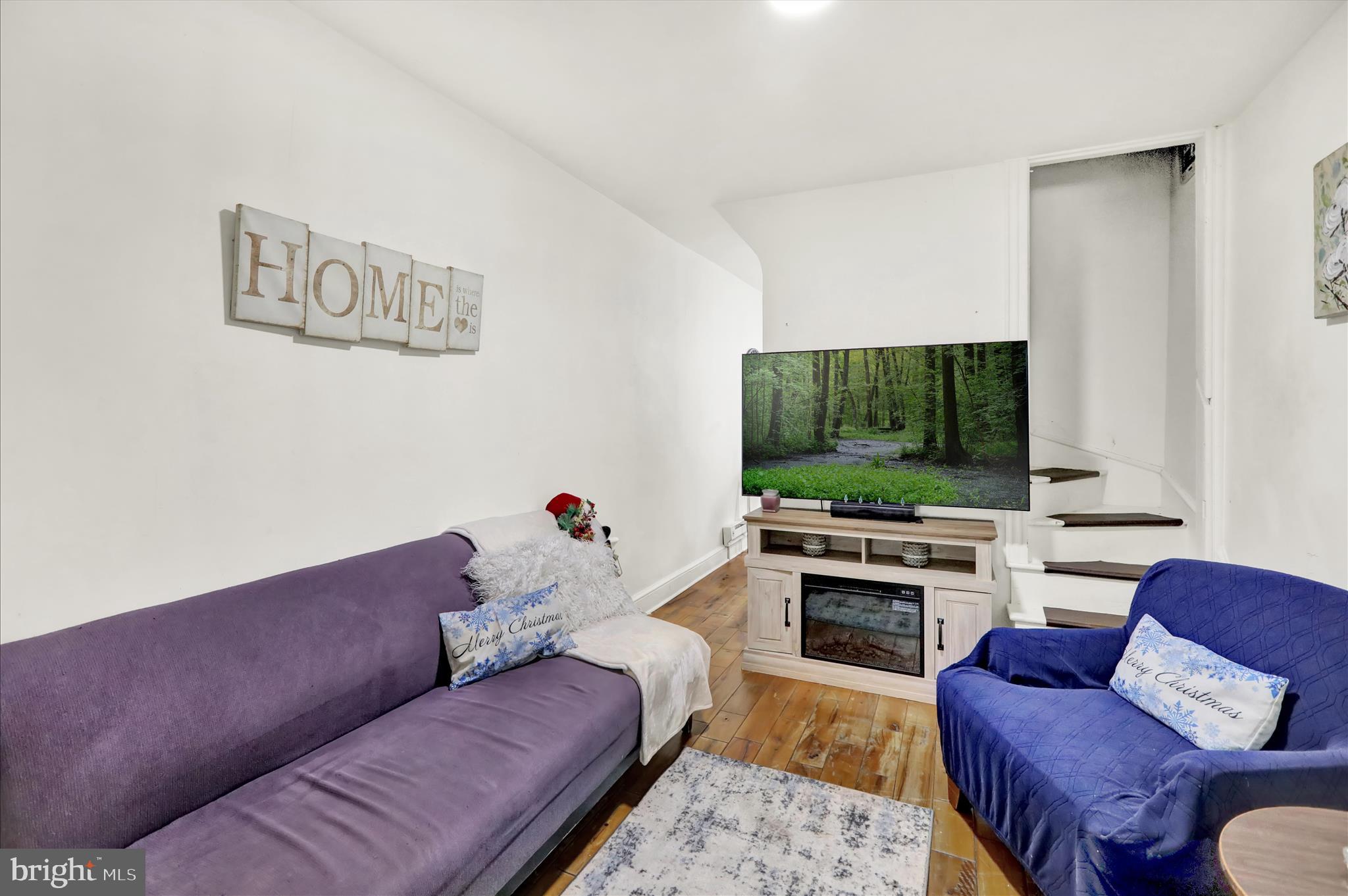 1328 Kenny Street Reading, PA 19602 - Photo 6 of 18 a living room with furniture and a flat screen tv