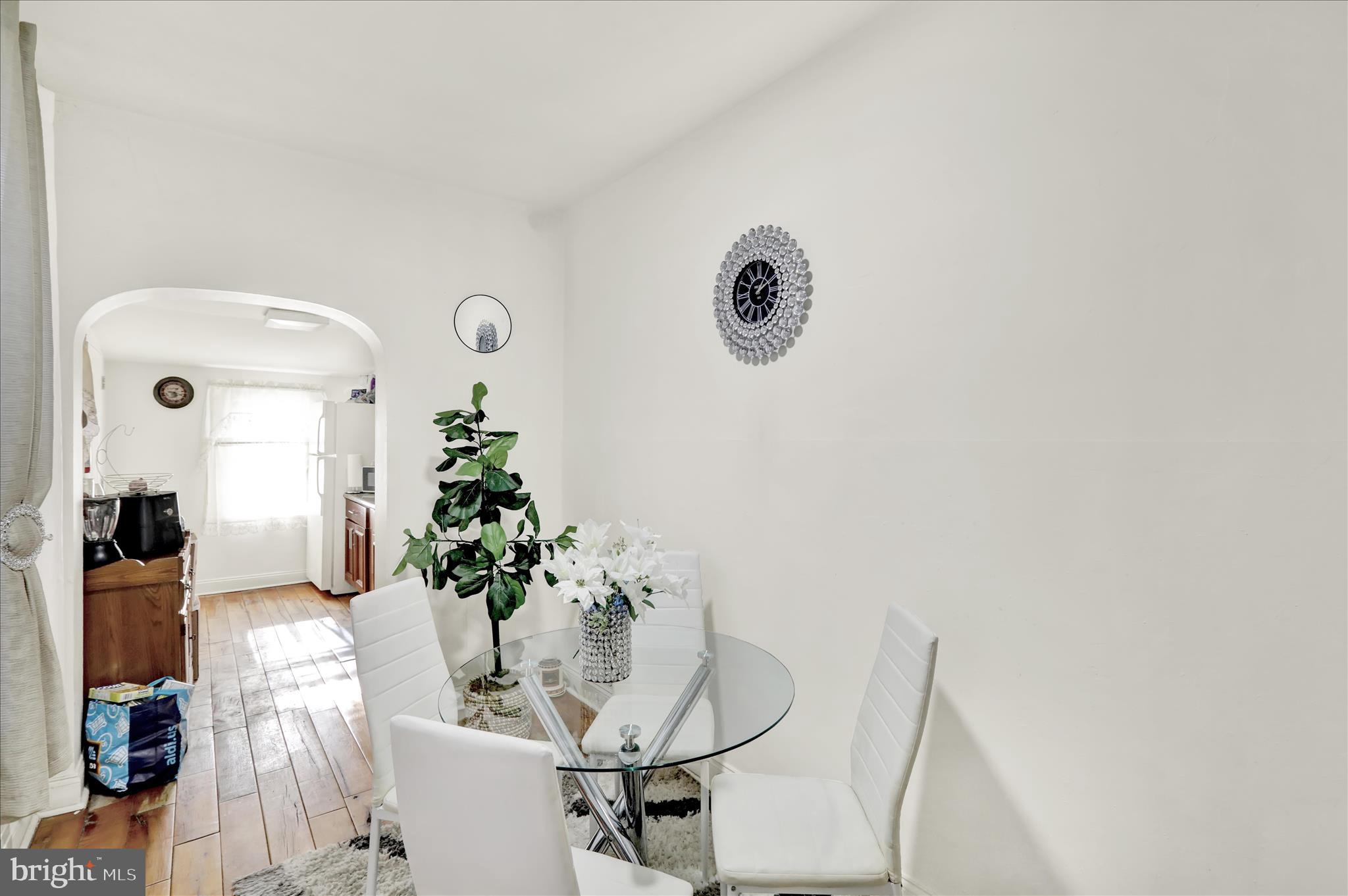 1328 Kenny Street Reading, PA 19602 - Photo 7 of 18 a view of a dining room with furniture and wooden floor