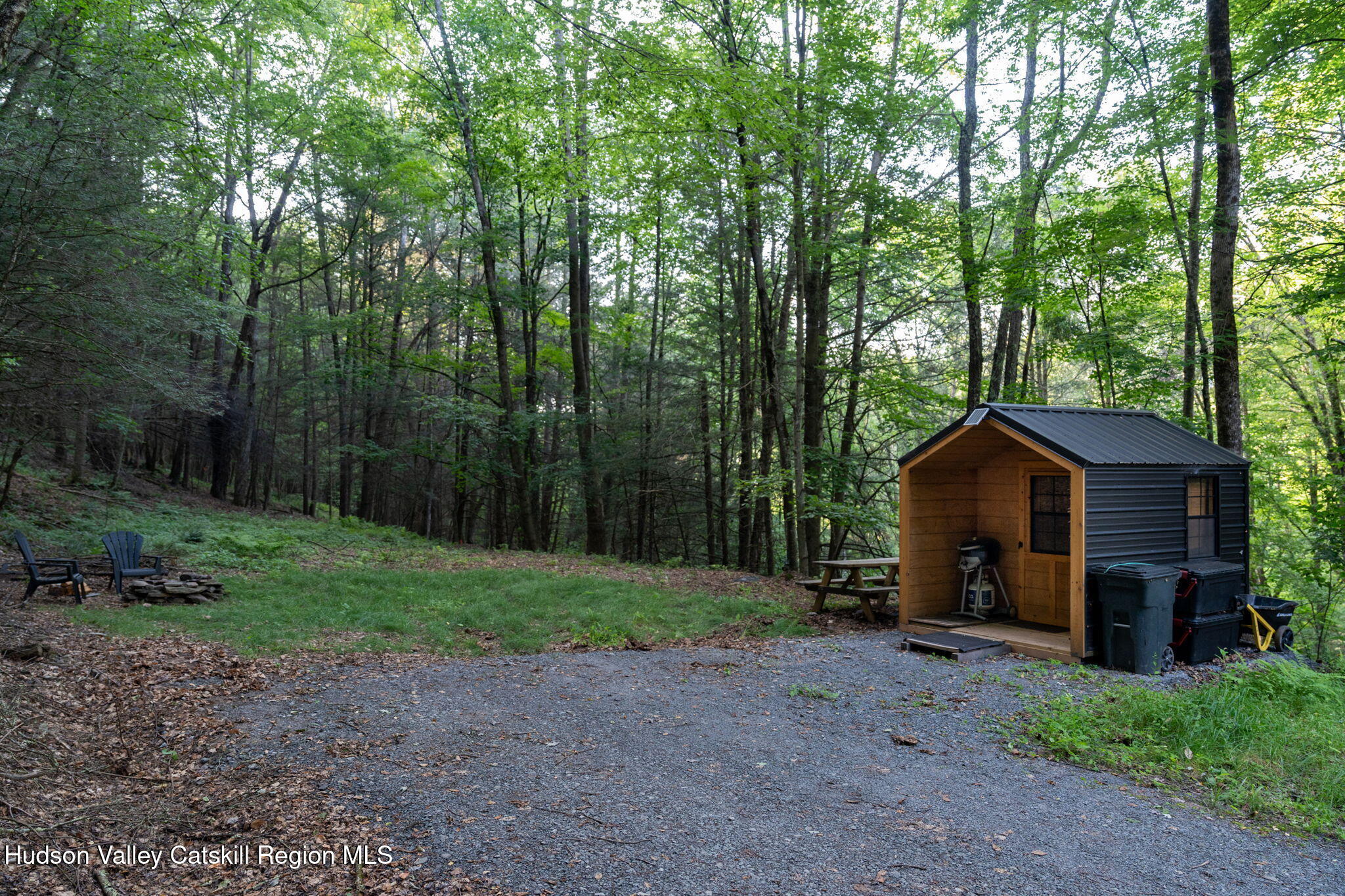 Tbd Tbd Broad Channel Road Andes, NY 13731 - Photo 8 of 23 a view of a wooden house with large trees and a yard