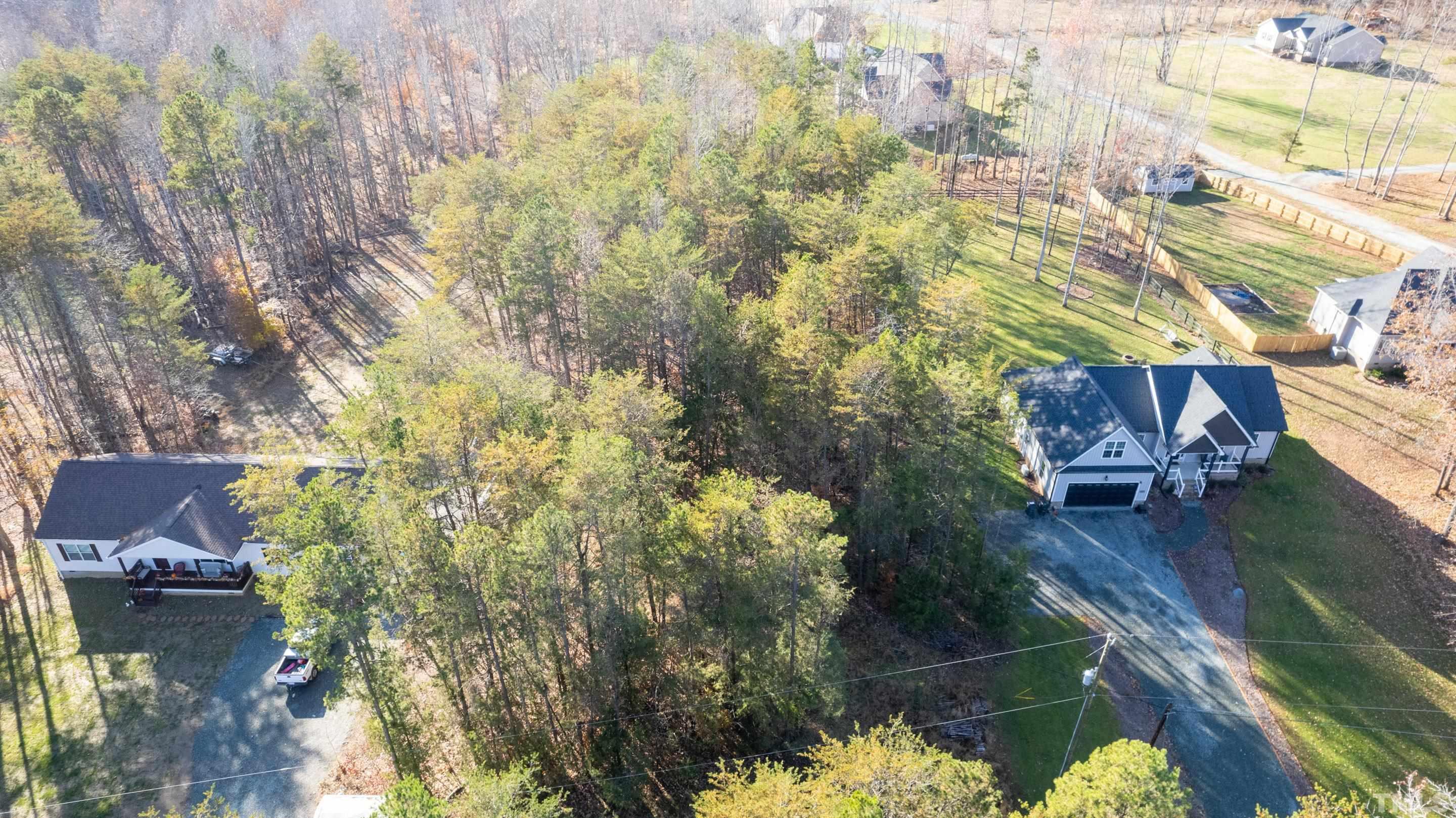 4045 Clapp Mill Road Burlington, NC 27215 - Photo 16 of 23 a view of house with yard