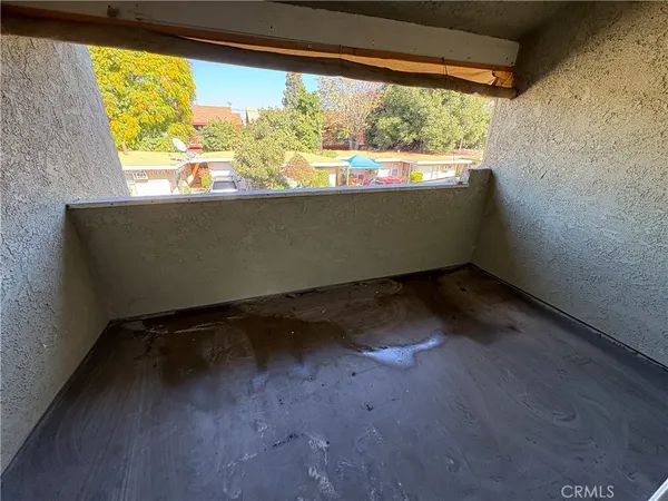 a bathroom with a sink toilet and mirror