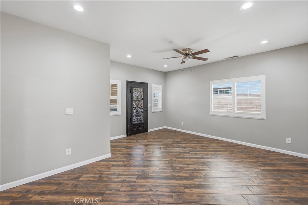 956 West Tibbot Street Rialto, CA 92377 - Photo 4 of 37 a view of an empty room with a window