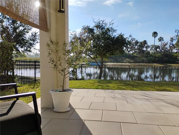 a view of a back yard from a balcony