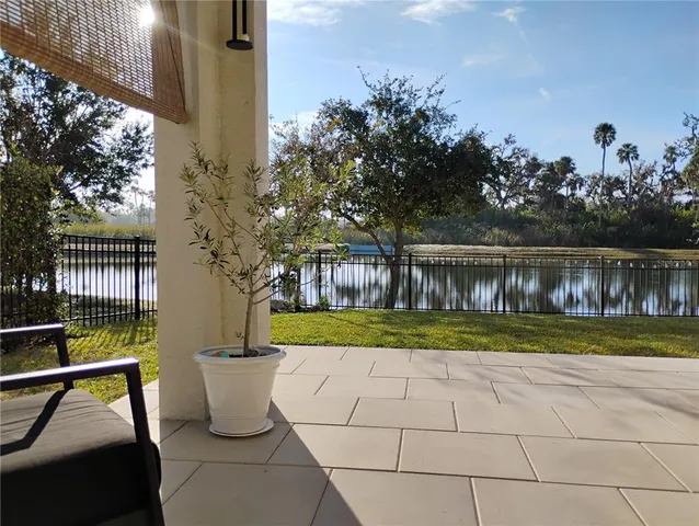 a view of a back yard from a balcony