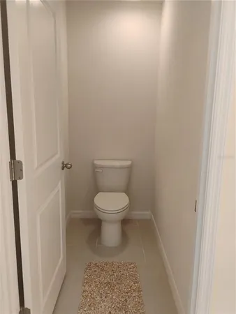 a front view of a house with a yard table and chairs