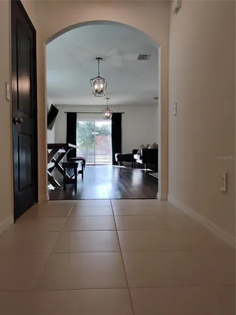 a vase of flowers sitting on a table