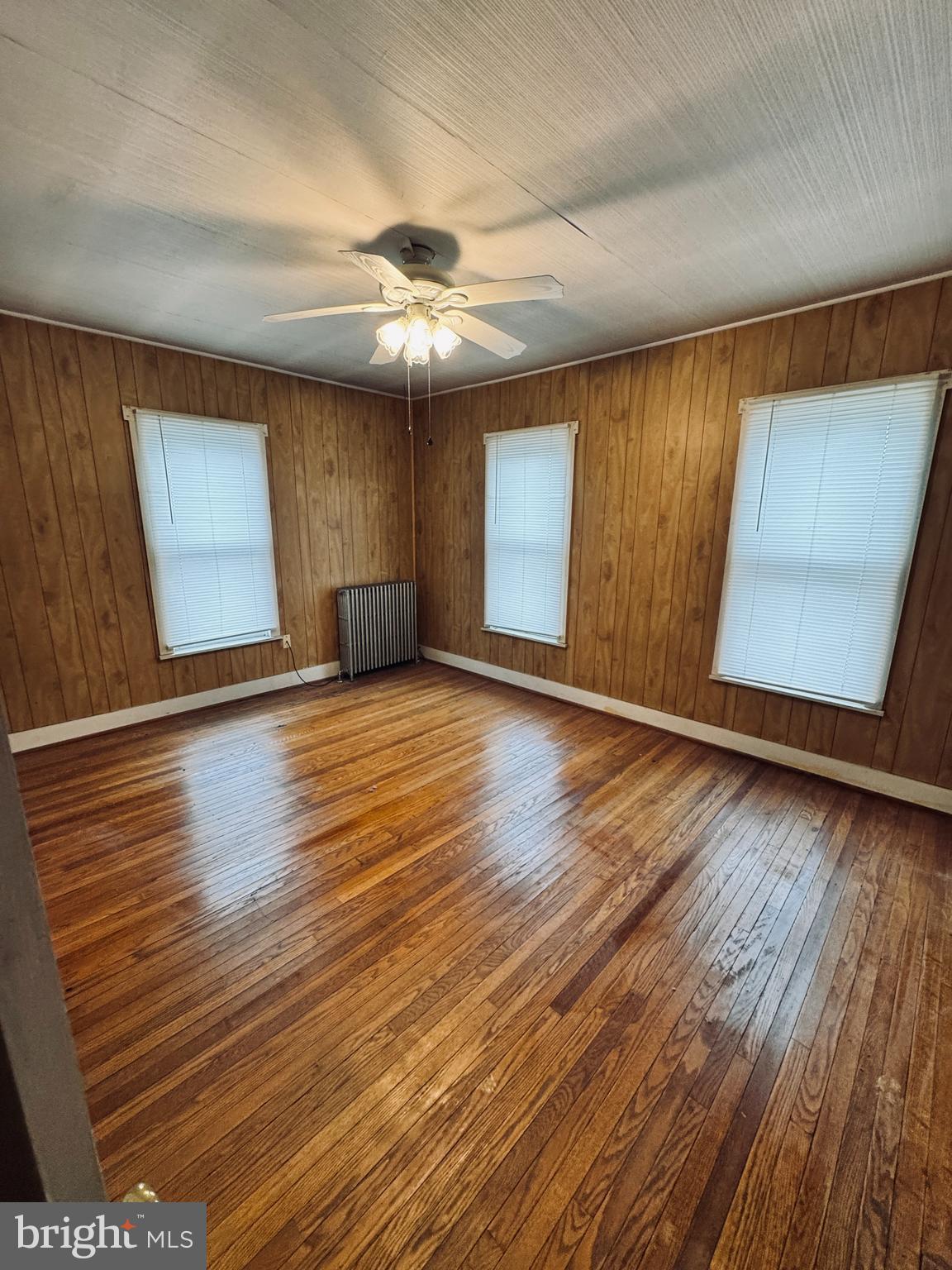 1137 West Main Street Valley View, PA 17983 - Photo 14 of 21 wooden floor in an empty room with a window