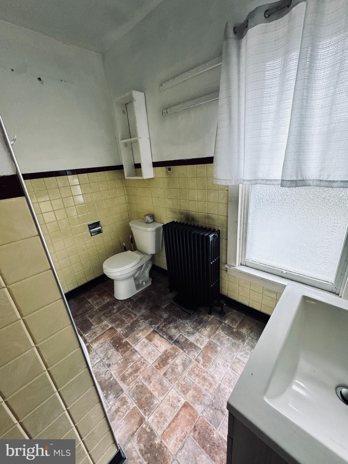 1137 West Main Street Valley View, PA 17983 - Photo 15 of 21 a bathroom with a sink and a toilet