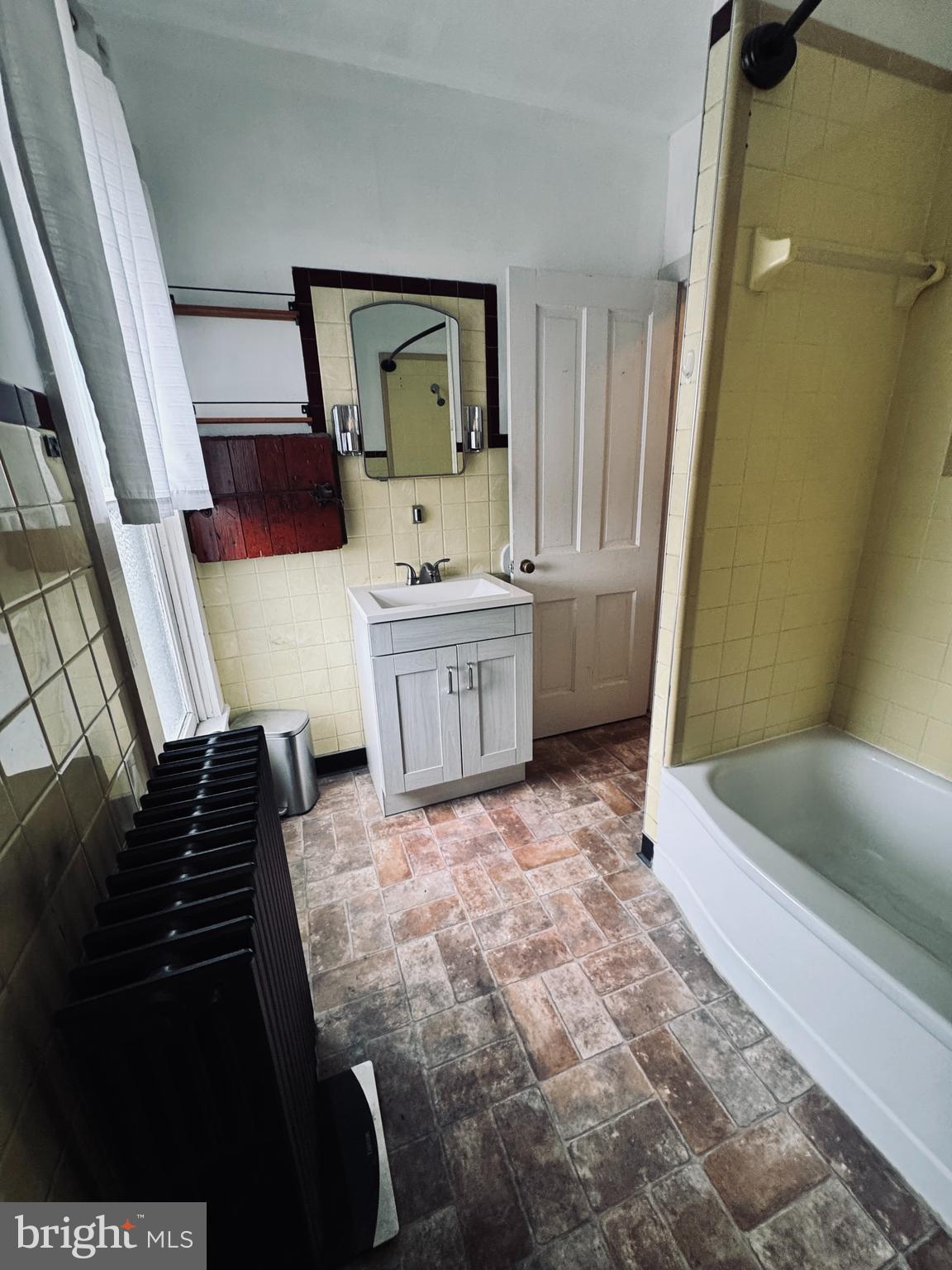 1137 West Main Street Valley View, PA 17983 - Photo 16 of 21 a bathroom with a bathtub sink and toilet