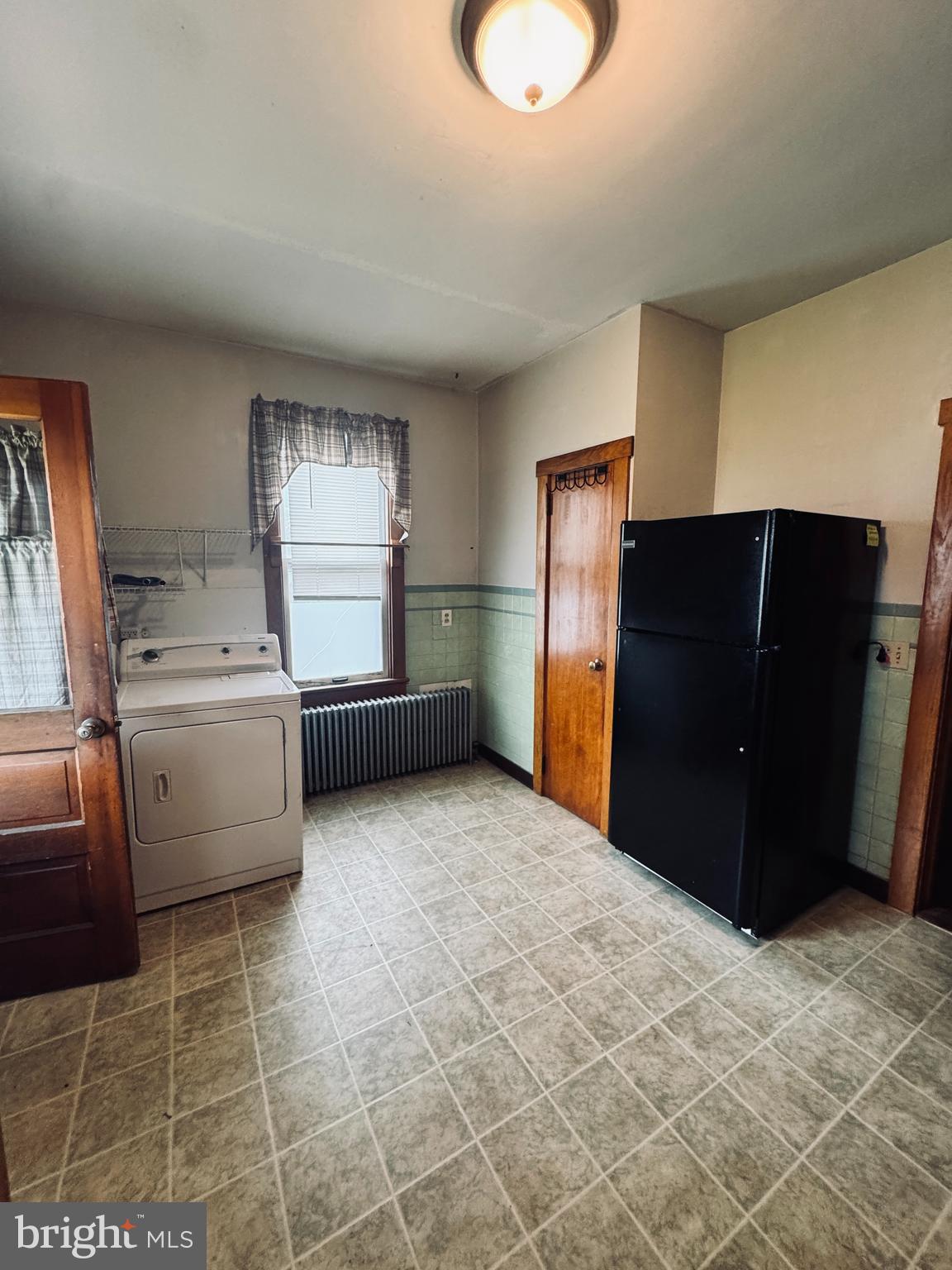 1137 West Main Street Valley View, PA 17983 - Photo 6 of 21 a kitchen with a stove a refrigerator and a cabinets