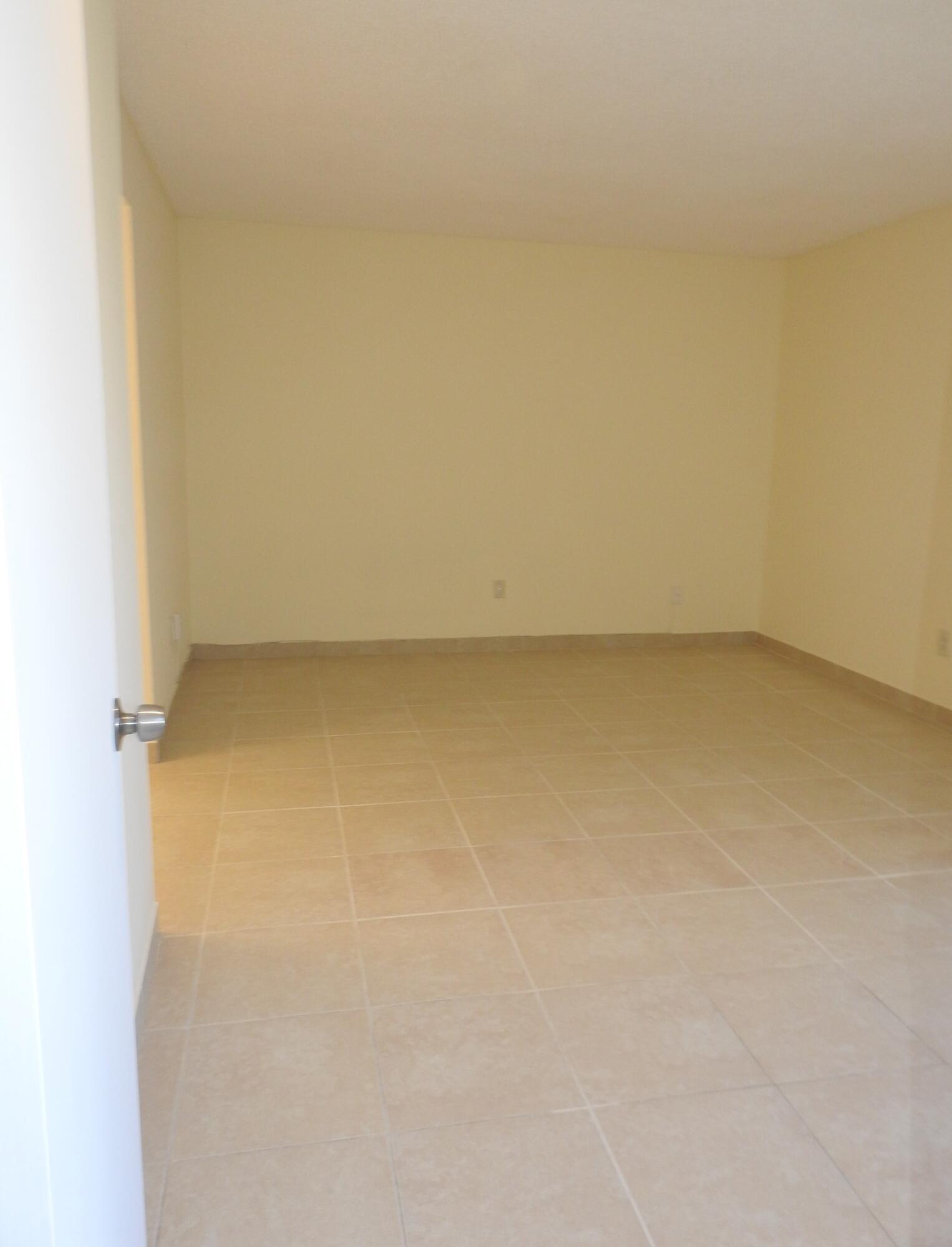 2600 Fiore Way, Unit 210 Delray Beach, FL 33445 - Photo 14 of 38 Primary bedroom