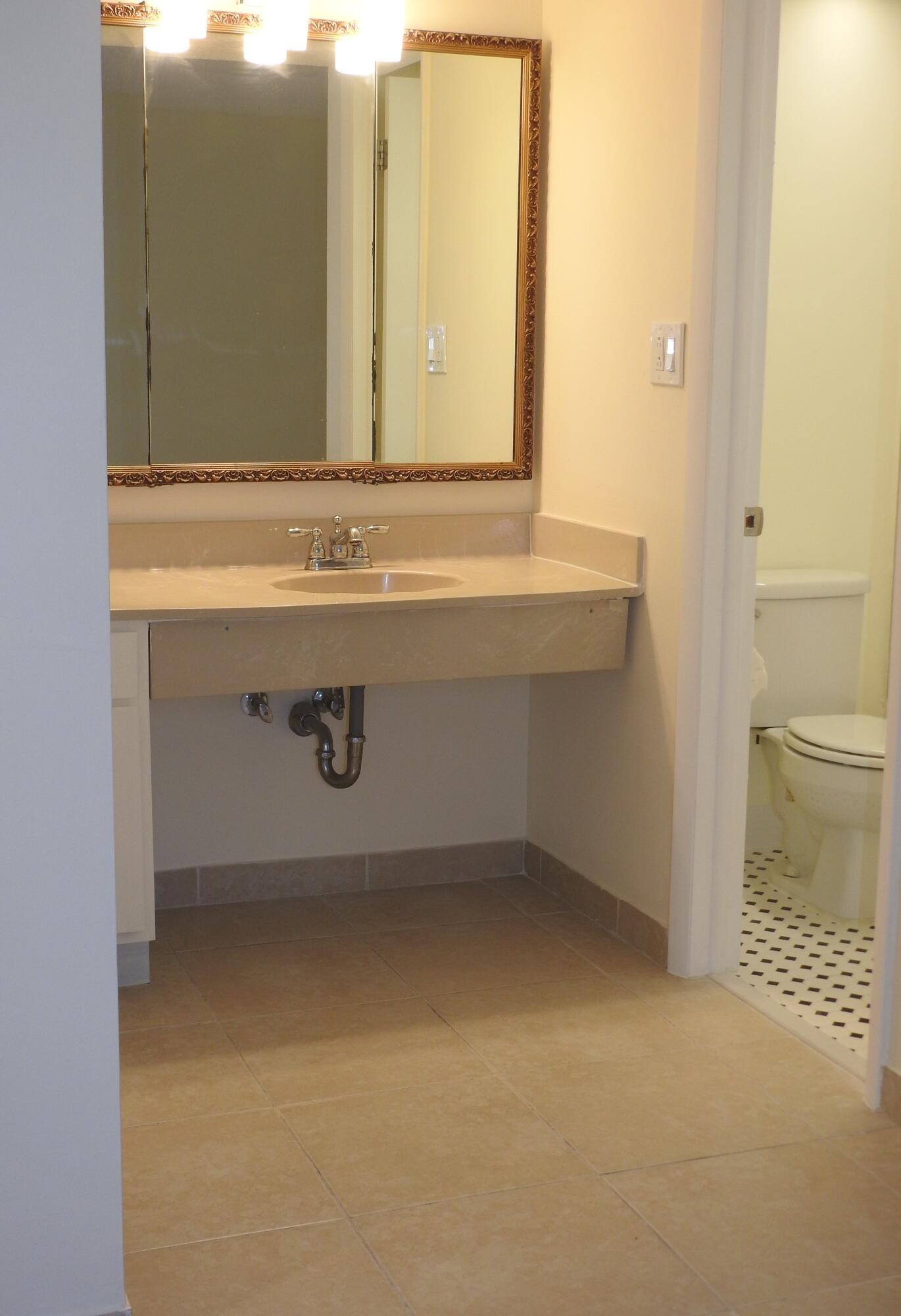 2600 Fiore Way, Unit 210 Delray Beach, FL 33445 - Photo 18 of 38 Primary Bathroom