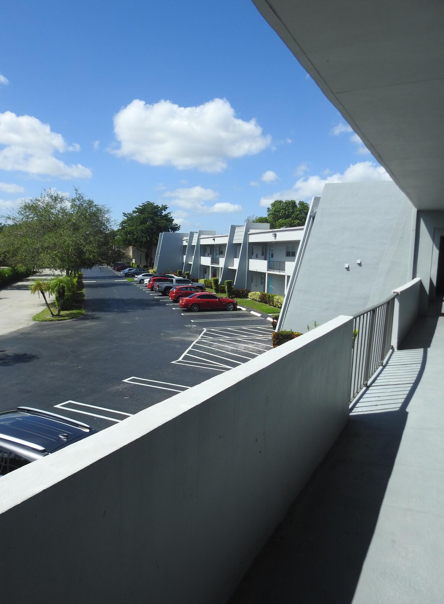 2600 Fiore Way, Unit 210 Delray Beach, FL 33445 - Photo 2 of 38 Front door view