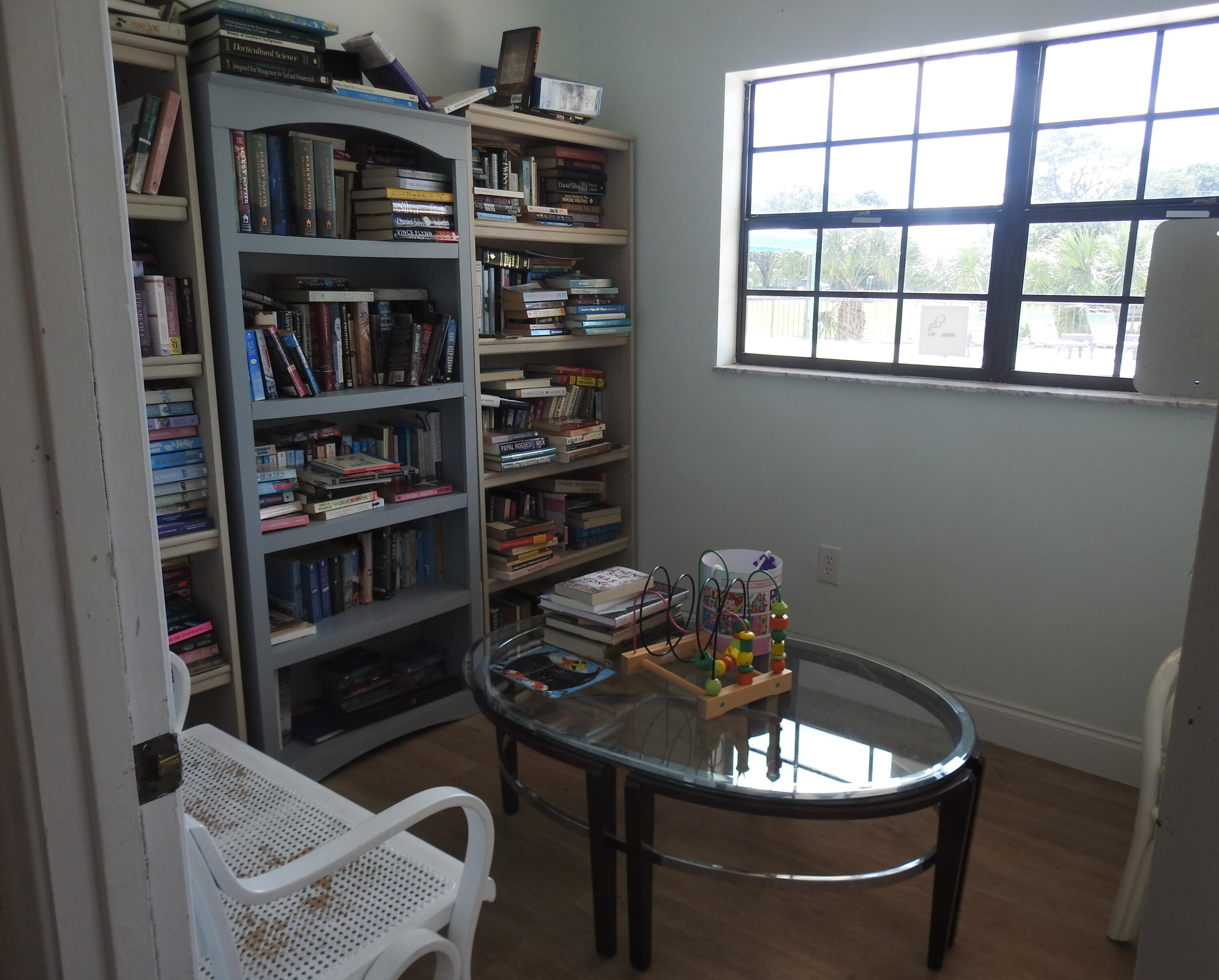 2600 Fiore Way, Unit 210 Delray Beach, FL 33445 - Photo 32 of 38 Club House Reading Rm