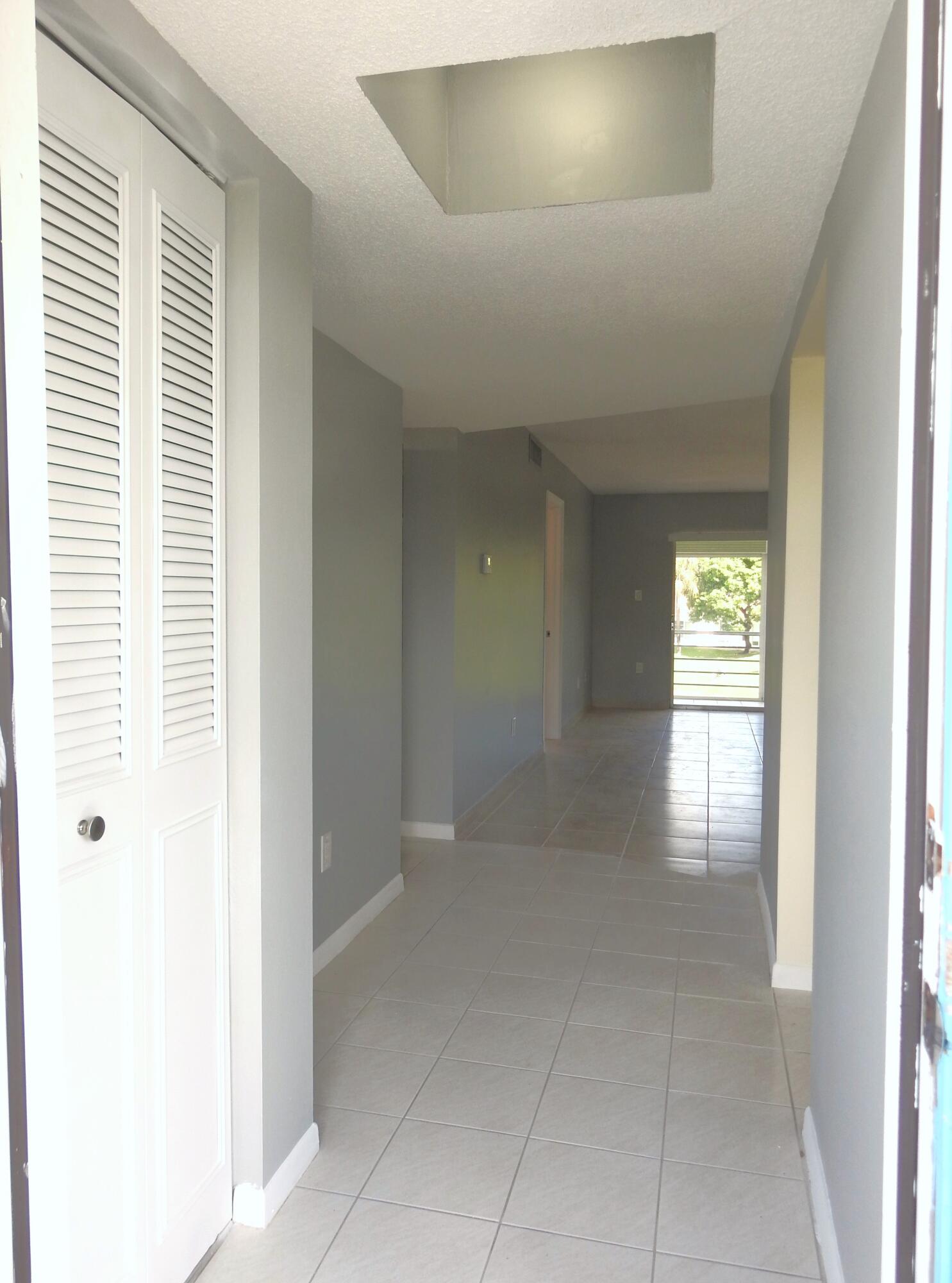 2600 Fiore Way, Unit 210 Delray Beach, FL 33445 - Photo 4 of 38 Entry way