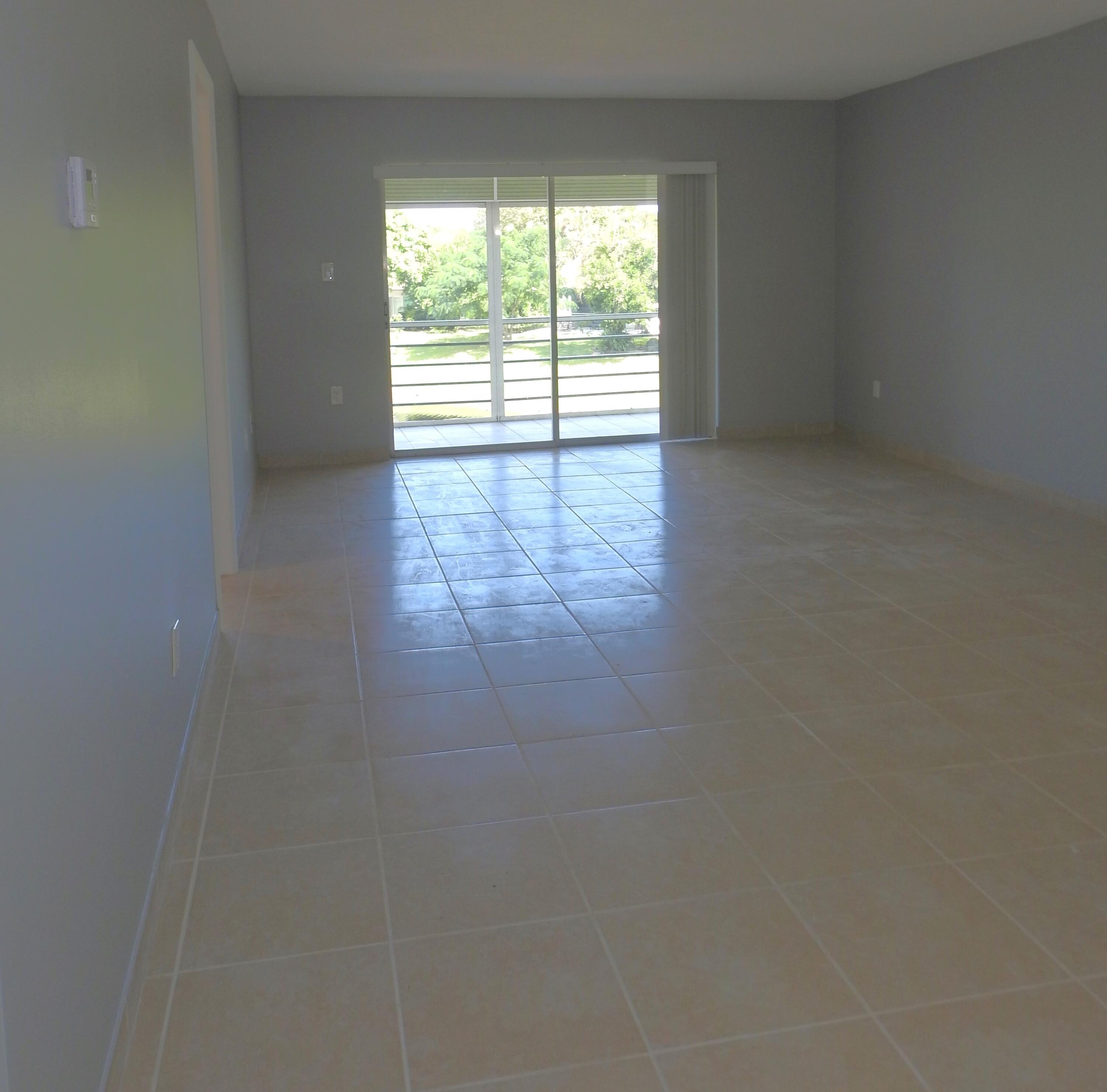 2600 Fiore Way, Unit 210 Delray Beach, FL 33445 - Photo 8 of 38 Living Rm