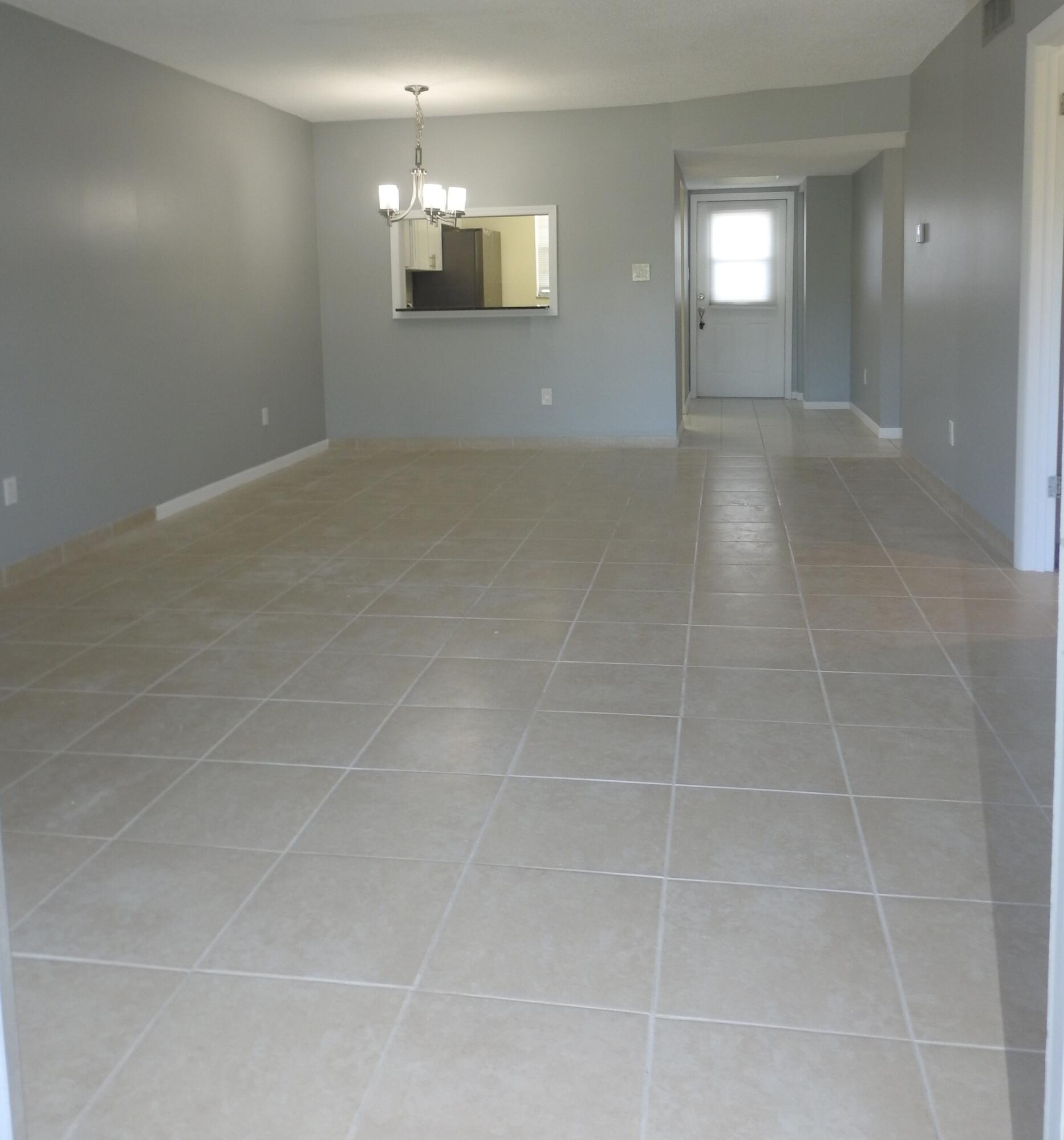 2600 Fiore Way, Unit 210 Delray Beach, FL 33445 - Photo 9 of 38 Dinning Rm- Living Rm