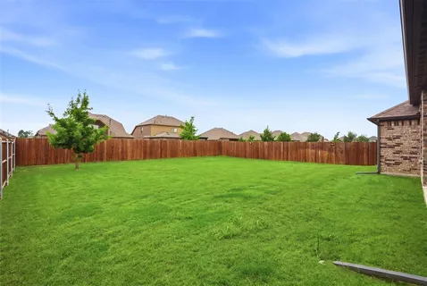 a view of an outdoor space and a yard