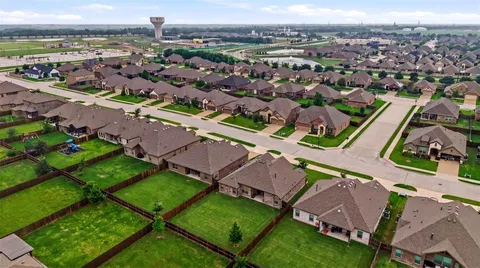 an aerial view of a house with a outdoor space